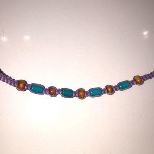 Purple braided bracelet with wood and turquoise beads, 13”